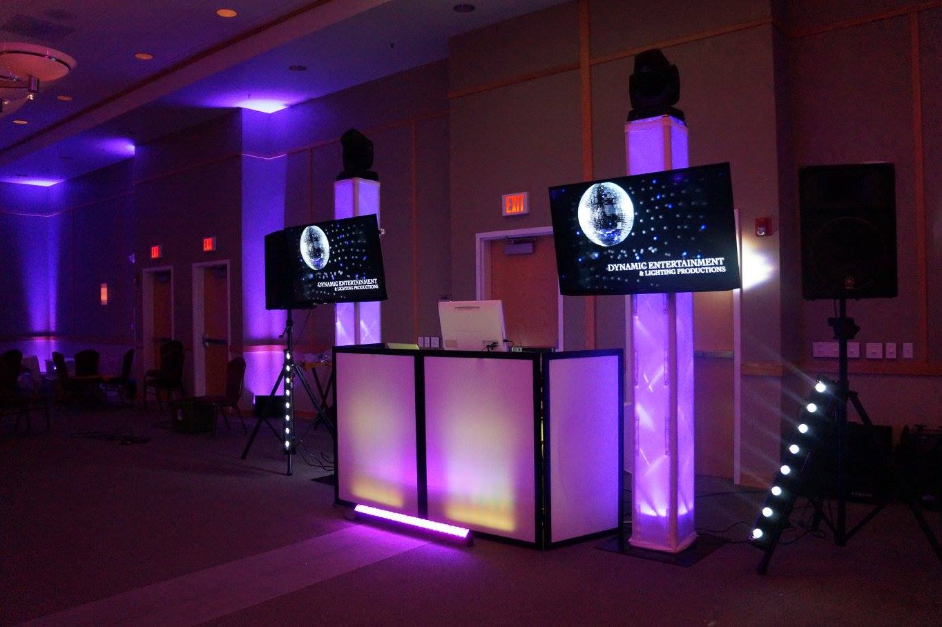 Dynamic Entertainment DJ setup with speakers and event lighting